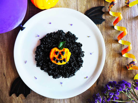 Riso al nero di seppia e crema di zucca