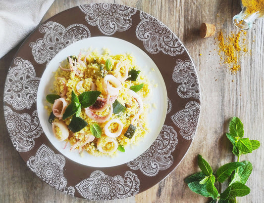 Cous cous con totani, zucchine e menta