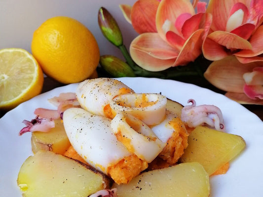 Calamari al forno ripieni con crema di zucca e mandorle